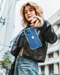 Person holding a blue phone case
