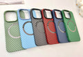 Four cased phones laid out on a table